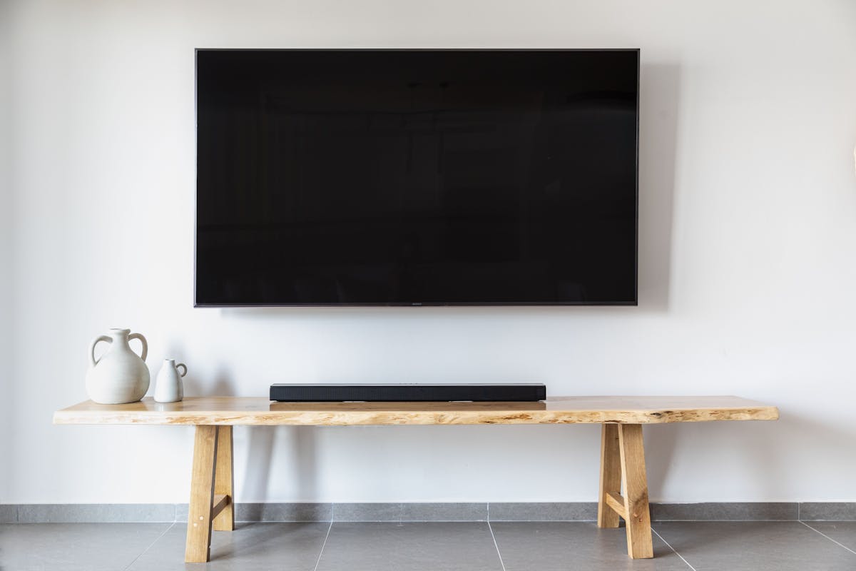 TV Mounting — Mounting a flat-screen TV flush or on an articulating arm.